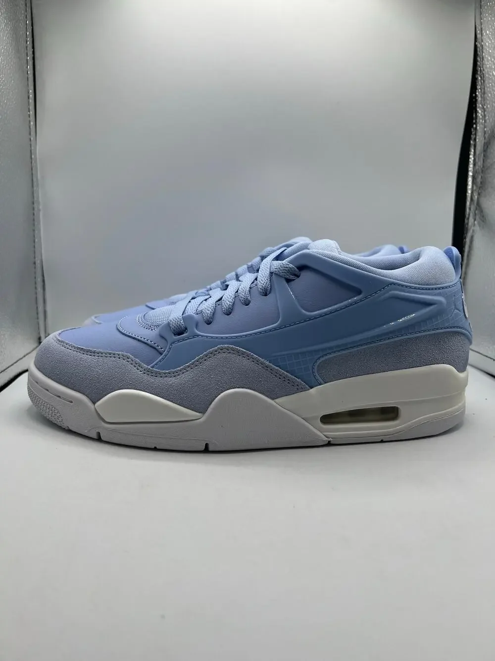 Air Jordan 4 RM “Aluminum” size 9.5 women’s